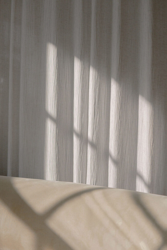 Soft light through a sheer curtain in the clinic